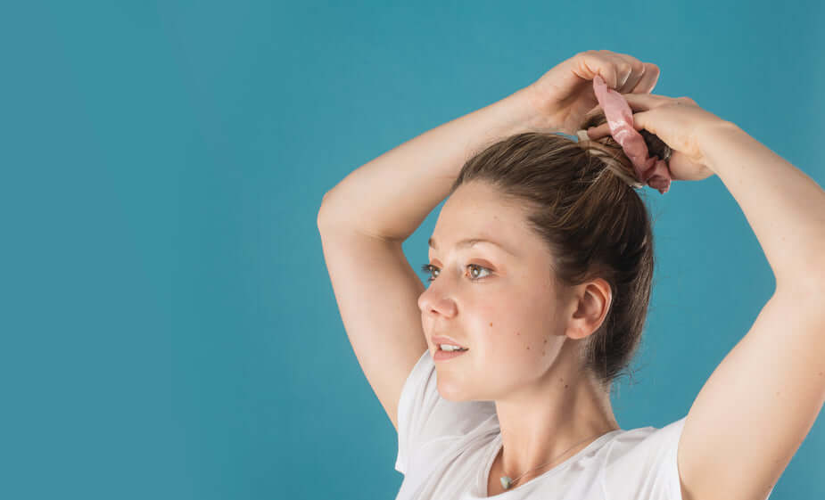 stop-hair-loss-woman-putting-her-hair-up